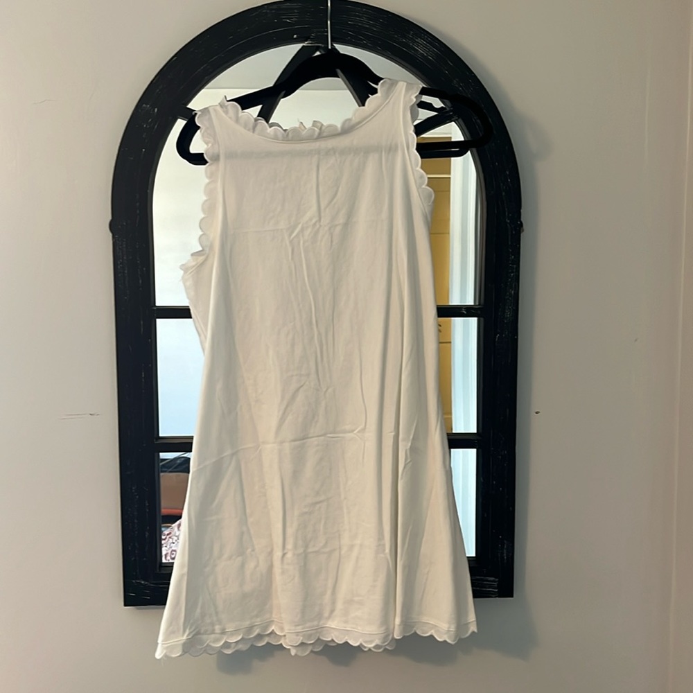 Super cute womens size large White linen minidress.  Never worn and no tags.